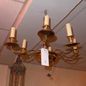 A brass six branch hanging chandelier