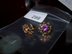 A pair of 9ct flower head form earrings