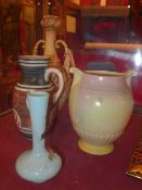 A Regist blush ivory vase with twin hand