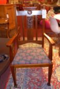 A pair of Art Nouveau mahogany chairs wi