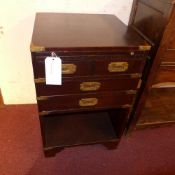 A campaign style mahogany and brass boun