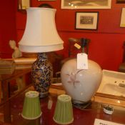 A baluster form table lamp glazed blue a