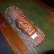 A South Pacific carved hardwood wall mas
