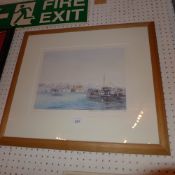 A glazed and framed limited edition prin