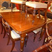 A Victorian mahogany extending dining ta