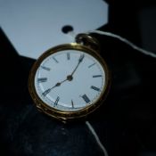 An 18ct gold pocket watch with enamelled