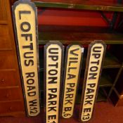 Five carved wooden replica road signs
