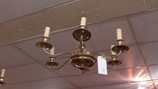 A brass six branch hanging chandelier