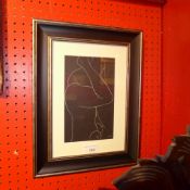 An Eric Gill print after a woodcut femal