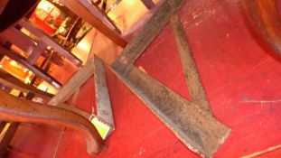 Two cast iron wall brackets