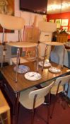 A retro faux rosewood dining table raise