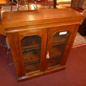 A Victorian walnut bookcase fitted pair