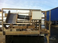 2009 Tigart Polythene Roller Table on stainless steel platform. Location Spalding, Lincolnshire