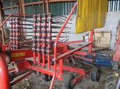 Fleming Galfre single rotor rake. 350-10 model, 2010. Location: Trowbridge, Wiltshire.