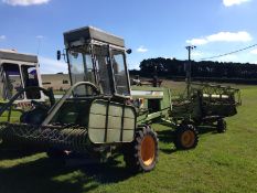 1993 Fortschritt E303 swather with straw turner, OSR swath and mowing headers. Hours: 2,056