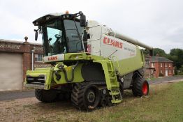 2009 Claas Lexion 600 Terra Trac combine harvester with V1050 cutter bar, Twin Laser Pilot, straw