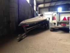 Laser sailing yacht with trailer.