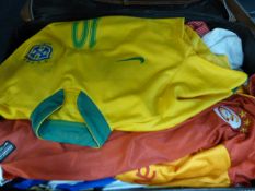 Approximately 25 International Football Shirts