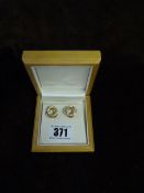 *Pair of 14 Carat Gold Stud Earrings