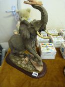 Elephant Figurine Entitled 