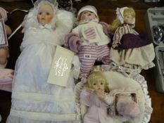 4 Porcelain Headed Dolls