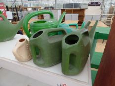 5 Watering Cans