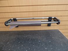 Wrapping Paper Dispenser with Cutter