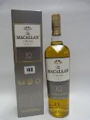 Bottle of Macallan Fine Oak Triple Cask Matured Scotch Whisky
