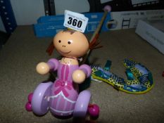 *Child's Push Along Toy & Another