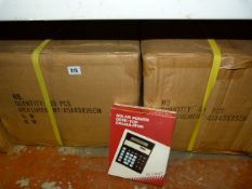 *2 Boxes containing Solar Powered Desktop Calculators