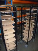 2 x grey  tray clearing trolleys with trays