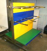 *Multicolour Tegometall clothing display gondola on wheels, 1250mm wide