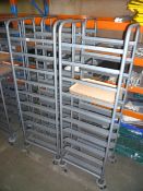 2 x grey  tray clearing trolleys with trays