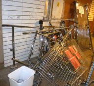 Large quantity of supermarket barriers , gates, security screens