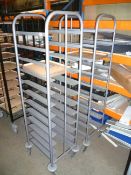 2 x grey  tray clearing trolleys with trays