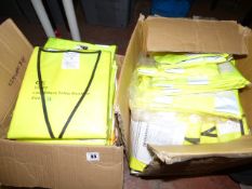 *2 Boxes containing Yellow fluorescent Vests