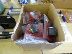 Box containing Travel Adaptors