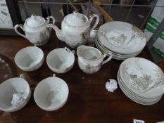 Oriental Tea Service with Embossed Geisha Girls