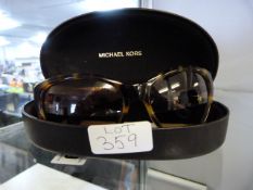 *Pair of Michael Korrs Sunglasses