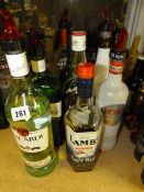 12 Bottles of Assorted Spirits