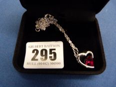 Silver Coloured Necklace with Red Stone