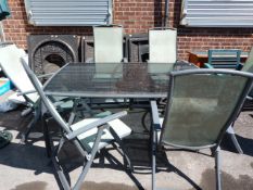Tubular Steel & Glass Dining Table with 6 Reclining Chairs