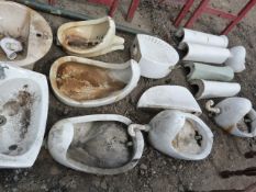 Assorted Urinals and Wash Basins