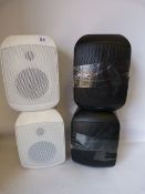 2 White and 1 Black Audio Speakers