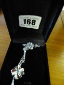 Ladies Silver Coloured Pendant of a Flower with a Blue Stone