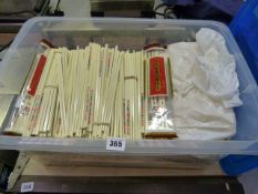 Box containing Large Quantity of Chopsticks