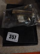 *Box Containing Cylinder Pattern Door Stops - Polished Brass Finish