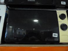 *Black & Cream Argos Microwave Oven