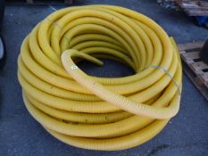 Roll of Yellow Flexible Piping
