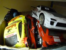 Box containing Remote Controlled Racing Cars